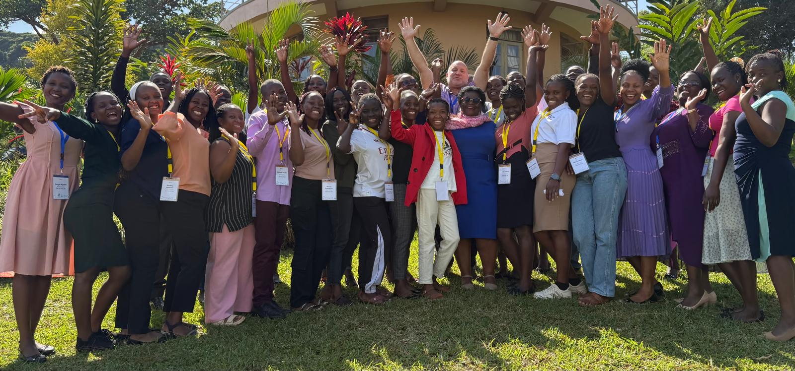 Renew Uganda educators and leaders celebrating together in Mukono